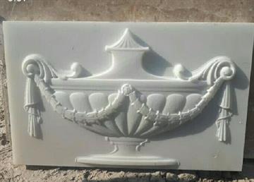 تزئینات سنگ راگا-تولید توزیع انواع تزئینات سنگ اعم از گل و گلبرک .سر درب .ستون و ...نرده سنگی و سرستون و پایه ستون و.